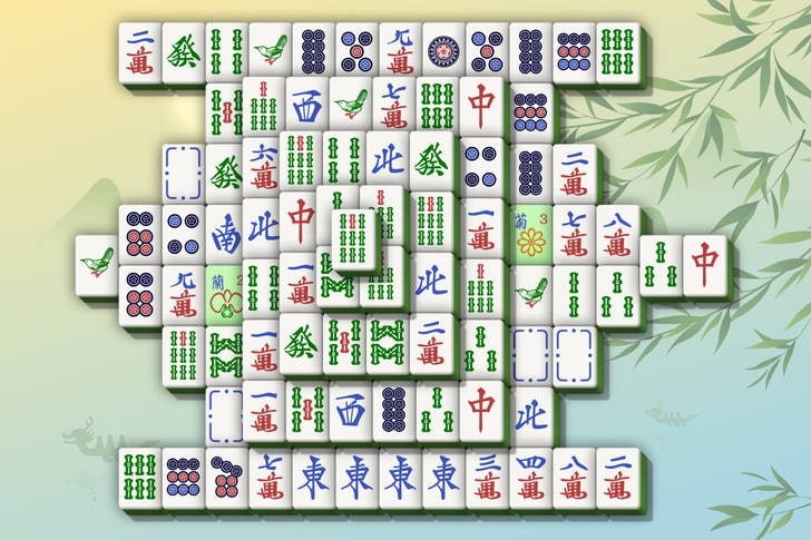 gameplay of Mahjong Solitaire, featuring tile arrangement and game interface